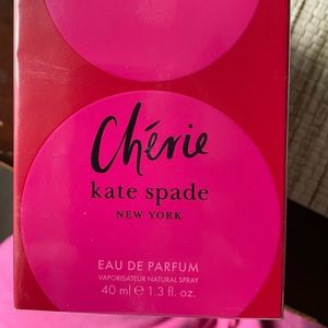 Brand new in box with plastic wrap on it. Kate Spade perfume.  1.3 ounces.